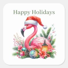 a pink flamingo wearing a santa hat and holding a lantern with christmas decorations around it