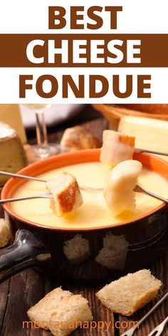 Fondue pot filled with cheese fondue with fondue forks with bread.  On the side of the pot is pieces of bread.  Overlay text The Best Cheese Fondue montanahappy.com Cheese Fondue Dippers, Cheddar Fondue, Fondue Dippers, Swiss Cheese Fondue