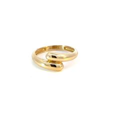 Prepare to bask in the glow of admiration! Our Solid Rendezvous Ring is more than just a piece of jewelry, it’s the meeting point for casual and everyday elegance. Crafted in 14K Gold you will love the smooth contours and unique feminine silhouette. It's ideal design makes it versatile enough to complement any outfit, from casual jeans and a tee to an evening dress. You will love all the ways you will wear it. Pairs beautifully with our Solid Rendezvous Hoop Earrings.

Size: 8mm (W)
14K Solid Go Modern Twist Yellow Gold Bypass Ring, Modern Twist Yellow Gold Bypass Ring For Formal Occasions, Modern 14k Gold Bypass Ring For Formal Occasions, Minimalist Polished Bypass Ring For Formal Occasions, Modern Twist Yellow Gold Stackable Rings With Polished Finish, Modern Twist 14k Gold Bypass Ring With Polished Finish, Modern Twist Yellow Gold Stackable Rings For Formal Occasions, Modern Twist 14k Gold Bypass Ring For Formal Events, Classic Bypass Ring With Polished Finish And Open Band