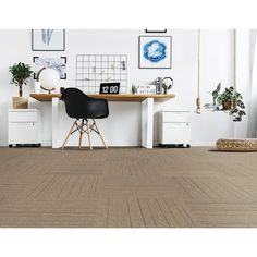 a room with white walls and wooden flooring that has a brown herringbone pattern on the floor