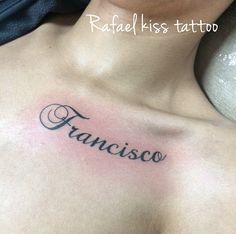 a woman with a tattoo on her chest that says francisco in cursive writing