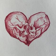 a drawing of two skulls in the shape of a heart with one skull facing each other