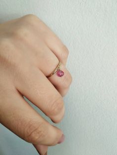 14K Gold Charm ring, Pink tourmaline ring, Gold dangle ring, 14K Gemstone ring, Stacking gold ring, Solid Gold ring, Gold boho ring, Simple gold ring, Gift for her, Bohemian ring, Stackable gold ring. Playful and vibrant charm ring with dangling dark pink rubellite tourmaline heart bead made in 14K or 9K solid gold. Wear it alone or stack it with other rings for an even more stylish, fun look! ;) Whisper...I want them all! More colorful gemstone rings here: https://www.etsy.com/shop/WhisperGold/ Gold Tourmaline Gemstone Rings, Gold Tourmaline Rings In Fine Jewelry Style, Gold Tourmaline Rings, Gold Tourmaline Birthstone Ring For Promise, Gold Tourmaline Ring In Fine Jewelry Style, Gold Tourmaline Birthstone Promise Ring, Dainty Red 14k Gold Rings, Dainty Stackable 14k Gold Ruby Ring, Red 14k Gold Dainty Birthstone Ring