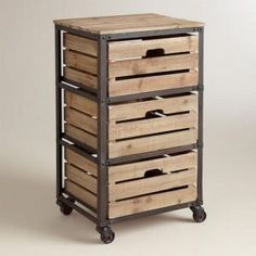 three wooden drawers with wheels on each side and one open drawer in the middle, against a white background