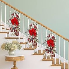 flowers are placed on the banisters next to the stairs