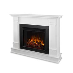 a white fireplace with flames on it