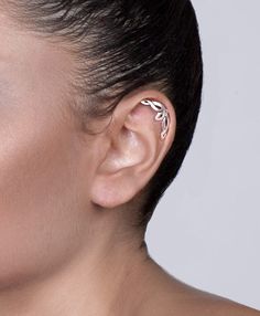 a woman with ear piercings on her ears