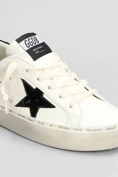 Hi Star Sneakers in white leather, laces, logo on tab, round toe, star on side, vinyl detail, quote on platform, logo on heel, worn effect, 100% leather, Made in ItalyGender: WomenMaterial: LEATHERColor: WHITEMade in: ITProduct ID: 408741_GWF00118F006188*Import tax/duty will be calculated at checkout (If applicable) Golden Goose Hi Star, Golden Goose Deluxe Brand, Star Sneakers, Golden Goose, White Leather, Color White, In Italy, Italy, Vinyl