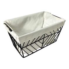 Organize with a chic storage solution. This rectangular black metal basket is the stylish answer to your storage needs. Fashioned from sturdy metal and fabric, it offers both functionality and elegance, instantly enhancing any room you place it in. Complete with a liner, it not only helps in keeping your items safe but also adds a cozy touch. Whether it's decluttering your living space or organizing your essentials, this versatile basket has got you covered. Includes a liner for added protection Black Metal Basket, Floor Candle Holders, Farmhouse Outdoor Decor, Floor Candle, Shelf Furniture, Metal Basket, Standing Candle Holders, Flameless Led Candles, Farmhouse Traditional