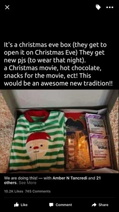 an open box filled with christmas items on top of a carpet