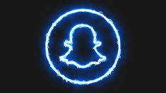 a glowing blue snapchat logo in the dark