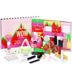 an assortment of cosmetics and makeup products displayed on a white background with the words holiday wow written in large letters