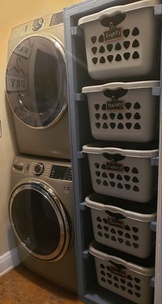 a washer and dryer sitting next to each other in front of a dryer