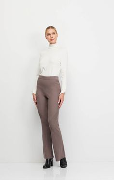 Inspire envy in these wide-leg rib-knit ankle pants where comfort is the name of the game. Their soft hand and easy drape feel good day or night. The swirly transfer ribs add allure. Elegant Stretch Ribbed Pants, Solid Color Ribbed Wide Leg Pants, Stretch Ribbed Wide Leg Pants Full Length, Elegant Ribbed Pants For Fall, Chic Full-length Ribbed Pants, Elegant Ribbed Bottoms, Chic Full Length Ribbed Pants, Elegant Ribbed Wide-leg Pants, Solid Ribbed Wide Leg Pants