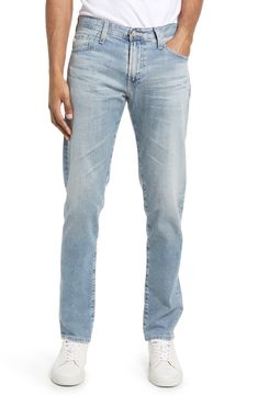 A well-worn wash puts a classic stamp on slim-cut jeans shaped from stretchy cotton denim. 33" inseam; 13" leg opening; 10 1/4" front rise; 15" back rise (size 32) Zip fly with button closure Five-pocket style 98% cotton, 2% polyurethane Machine wash, tumble dry Imported Men's Clothing Straight Washed Blue Jeans, Washed Blue Straight Jeans, Classic Washed Blue Jeans With Five Pockets, Classic Faded Jeans With Five Pockets, Straight Washed Blue Rigid Denim Jeans, Classic Washed Blue Jeans With Standard Cut Leg, Classic Faded Jeans With Straight Hem, Classic Faded Bottoms With Five Pockets, Classic Faded Straight Jeans