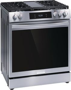 a stainless steel oven with four burners