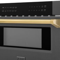 a black and gold microwave oven with the door open to show it's electronic controls