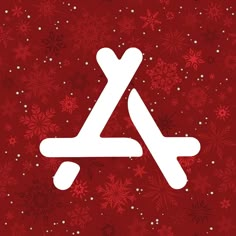 a red background with snowflakes and white letters that read x on the bottom