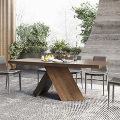 a modern dining table with two chairs and an open book shelf in the center, surrounded by greenery