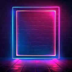 an empty room with neon lights and a square frame on the floor in front of a brick wall