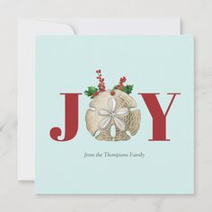 a christmas card with the word joy written in red and white on top of it