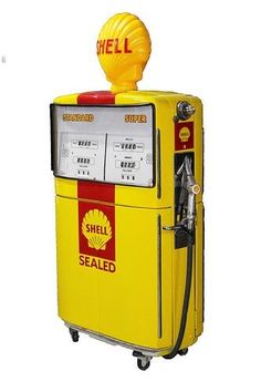 a yellow shell gas pump sitting on top of a white floor