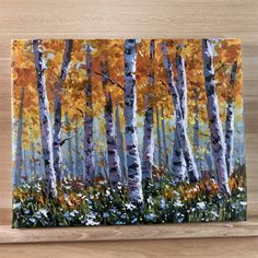 an acrylic painting of trees with yellow leaves