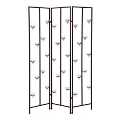 a tall room divider with metal handles and knobs on each side, in black