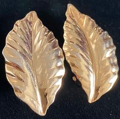 Like new signed Louis Feraud, Paris, clip earrings. These earrings measure 1 1/4" X 3/4". Earrings are gold plated leaf motif, with sturdy clip. Earrings are in excellent vintage condition.  Returns are on case by case basis. Please contact me within 3 days of receipt with any problems. I like happy customers 😃.  Mother Earth 🌍 thanks you for all you do to protect her🌹 4 Earrings, Louis Feraud, Gold Leaf Earrings, Leaf Motif, Clip Earrings, Leaf Earrings, Mother Earth, Gold Leaf, Clip On Earrings