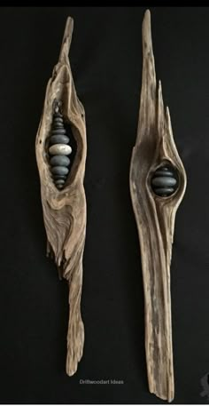 two pieces of driftwood with beads in them