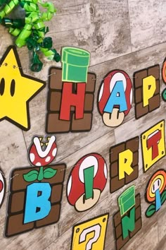 a happy birthday banner made out of cut outs