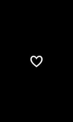 a black background with a white heart in the middle