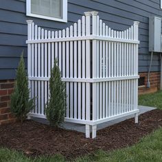 three different types of fences in front of a house