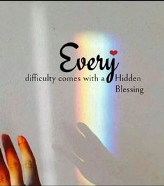 a person's hand is shown with the words, every difficulty comes with a hidden blessing