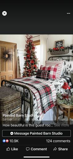 a bedroom decorated for christmas with red and black decorations on the bed, plaid comforter, and pillows