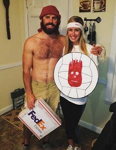 a man and woman are dressed up as zombies with handprints on their faces