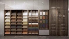 a display case filled with lots of different types of floor coverings and samples of wood