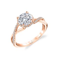 a rose gold engagement ring with an oval diamond center and side stones on the shan shan shan shan shan shan shan shan shan shan shan shan shan shan shan shan shan shan shan shan shan shan shan