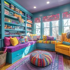 a brightly colored living room with lots of bookshelves and colorful pillows on the couches