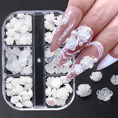 PRICES MAY VARY. ❤️CUTE CAMELLIA NAIL CHARMS- Flat back, open camellia design to give your nails some unique flair( 90pcs Single size approximate: 6mm-8mm)Suitable for all nails. ❤️2022 UNIQUE NAIL ART - New diverse floral nail elements make your nail art unique. Suitable for your nails on the beach in summer. These are fashionable and suitable for a wide range of women&girls. Suitable for all seasons, spring, summer, autumn, winter. ❤️EASY TO USE - Built-in flat backs can be easily applied to n Flower Nail Charms, Nail Art Jewelry, Manicure Diy, Studded Nails, Acrylic Flower, Nail Art Sticker, Rose Nails, Flower Nail, Flower Nail Art