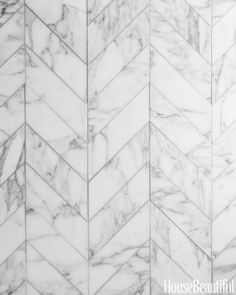 a white marble herringbone pattern wallpaper