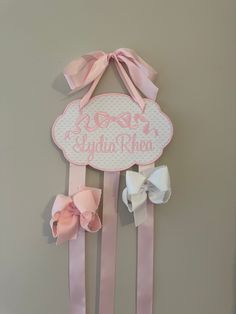 🎀🎀This is an adorable way to store and display your daughter's bows. It is a wonderful baby shower gift, birthday gift, or welcoming gift.  🎀This listing is for one bow holder. It is made with high quality swiss dot or pique bitty dot fabric. The back is covered so no embroidery will show through.  🎀 Approximate size is 9.50"x 6.50" Disclaimer: This is not a toy and is to be used for decoration purposes.  Returns: I do not accept returns due to the personalization of the product. Please mess Hair Bow Organizer, Bow Organizer, Hair Bow Holder, Nursery Room Inspiration, Dot Fabric, Bow Holder, Dotted Fabric, Girl Shower, Girl Stuff