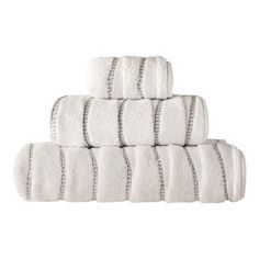 six white towels stacked on top of each other