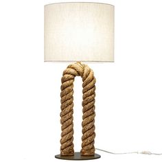 a rope lamp with a white shade on it