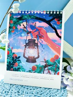 a calendar with an image of a person holding a lantern in front of flowers and branches