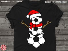 a t - shirt with a soccer ball in the shape of a snowman wearing a santa hat