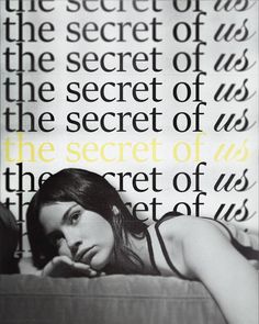 a woman laying on top of a couch in front of a wall with the words secret of us