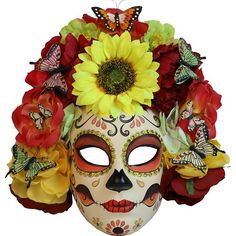 Celebrate Día de Los Muertos in style with the Reina de Flores Mask! You're the Queen of Flowers in this sugar skull mask featuring a big crown of flowers with butterflies. Day of the Dead Reina de Flores Mask product details:  Plastic and fabric One size fits most teens and adults Sugar Skull Mask, Flowers With Butterflies, Crown Of Flowers, School Holiday Party, Sugar Skull Costume, Day Of The Dead Halloween, Fabric Flower Bouquet, Big Crown, Diy Balloon Decorations