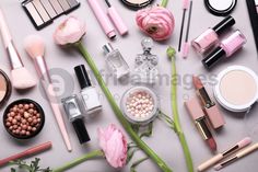 Flat lay composition with different makeup products and beautiful spring flowers on gray background Gray Background, Top Trends, Composition, Spring Flowers, Spring Fashion, Stock Photos