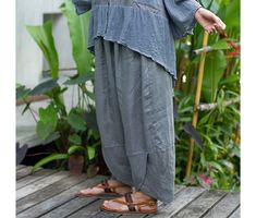 Grey linen harem pants, oversized linen pants for women, with elastic waist and pockets, grey casual linen trousers, grey plus size pants STYLE - Low- crotch/ drop crotch - Harem - Elastic waistband - 2 side pockets COLORS/MATERIALS 1. Brown - 100% medium weight linen  - Unlined 2. Grey - 100% medium weight linen - Partially lined with 100% cotton 3. Light brown - Cotton rayon mix, embroidered - Partially lined with rayon fabric 4. Natural - 100% medium weight linen, embroidered - partially lined with 100% cotton 5. Off-white - 100% medium weight linen - Partially lined with 100% cotton 6. Army green - 100% medium weight linen - Unlined  SIZING The following measurements are of the pants itself. - Waist circumference: Stretching from 24 to 55 in. (61 - 140 cm.) - Hips circumference of the Oversized Linen Pants, Linen Pants For Women, Linen Harem Pants, Plus Size Pants, Gray Linen, Linen Trousers, Linen Pants, Medium Weight, Fashion Pants